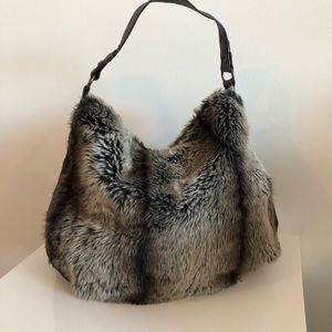 Faux fur and brown handbag
